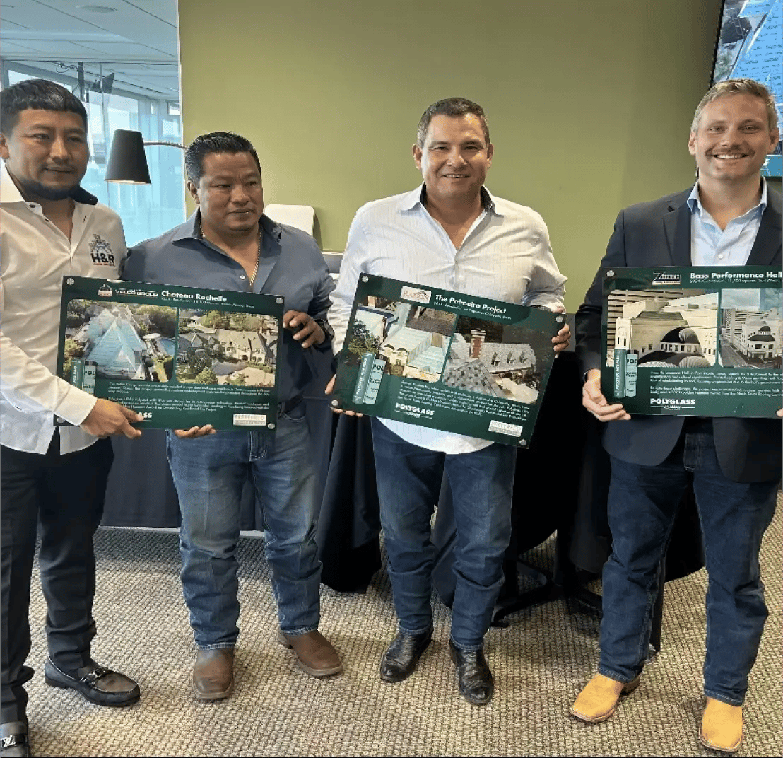 Ramon Roofing Team holding awards.